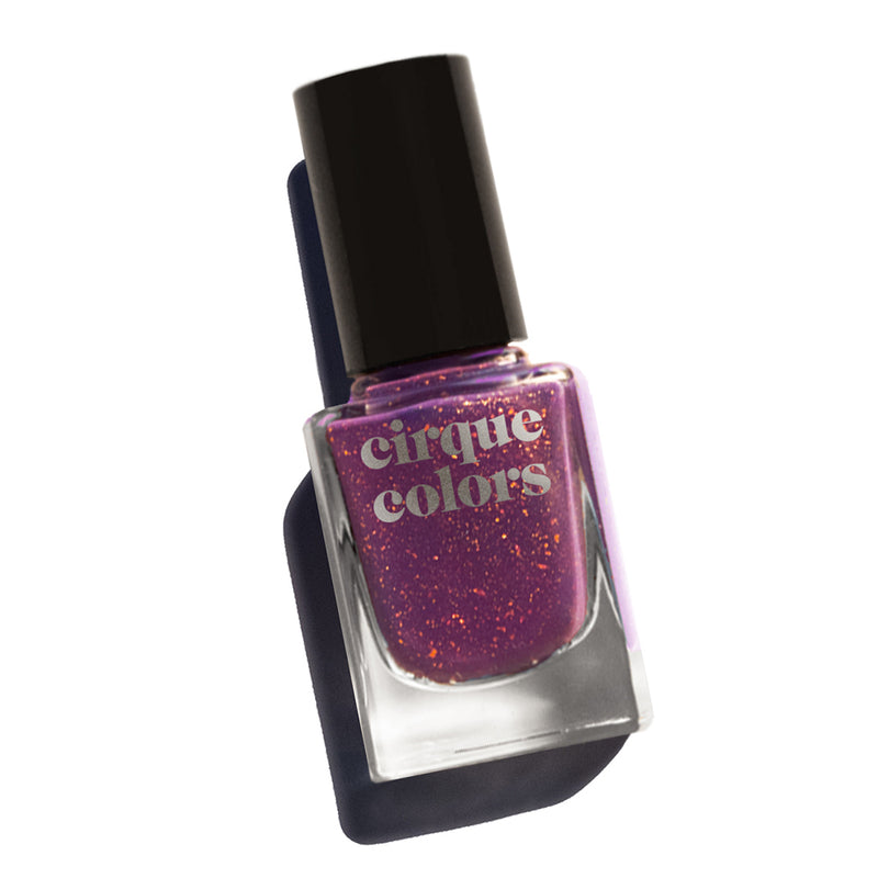 Cirque Colors Izola royal purple nail polish with gold metallic specks Resort Collection