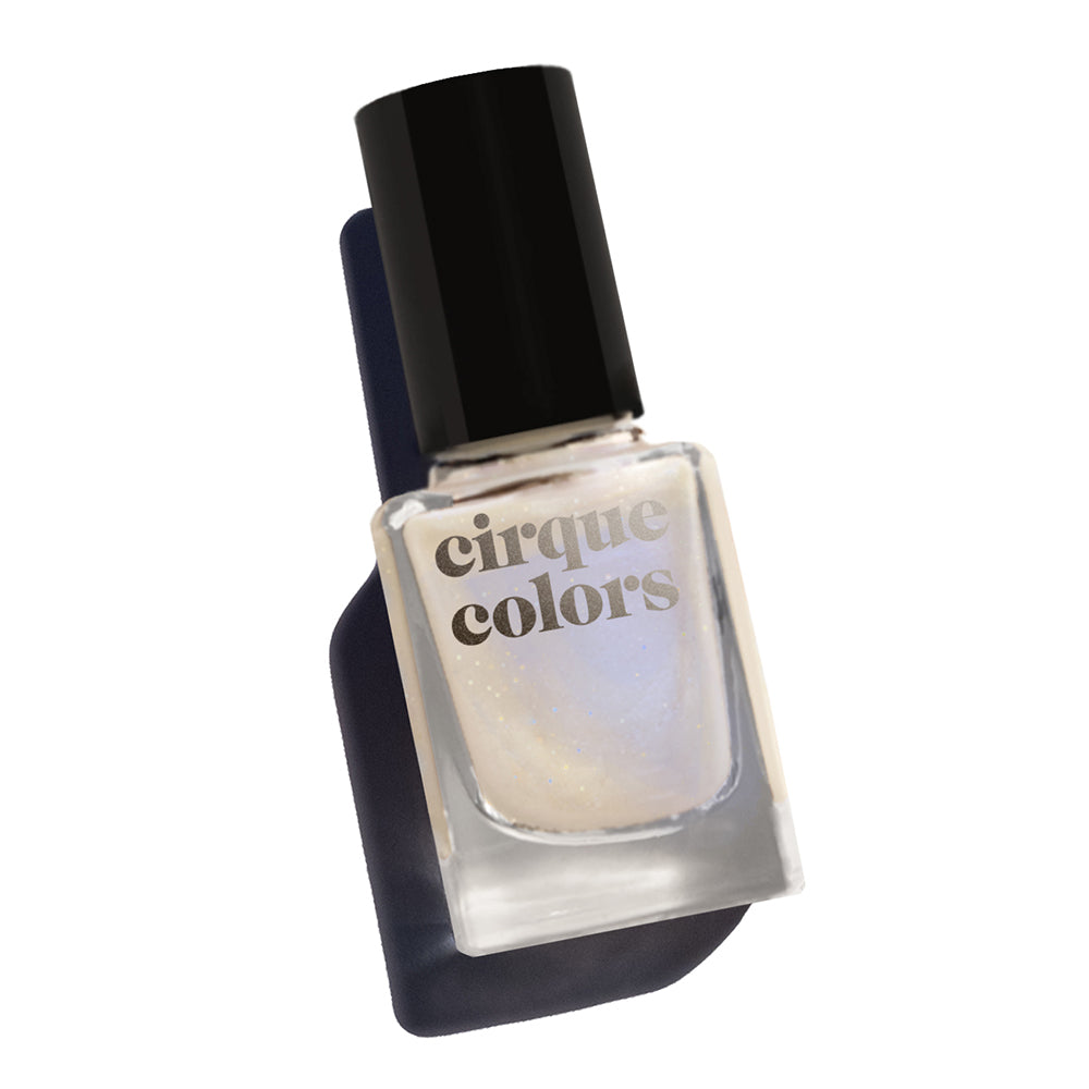 Cirque Colors Mystic Moonstone milky sheer nail polish with blue shimmer Resort Collection