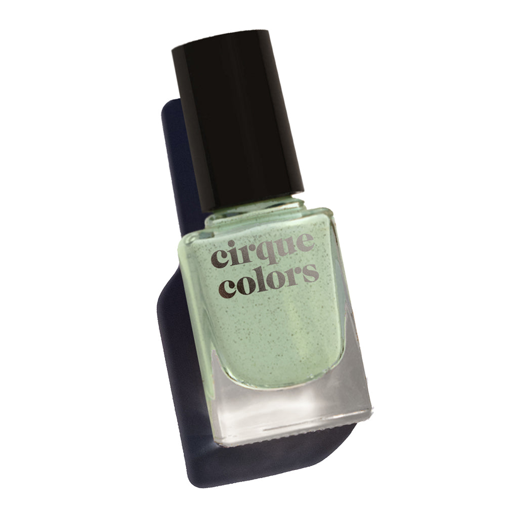Cirque Colors Paloma dusty sage nail polish with fine black specks Resort Collection